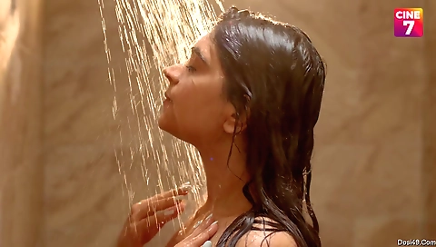 Beautiful brunette with a nice smile is playing with her fingers