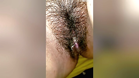 Indian slut is showing her hairy body and a shaved pussy