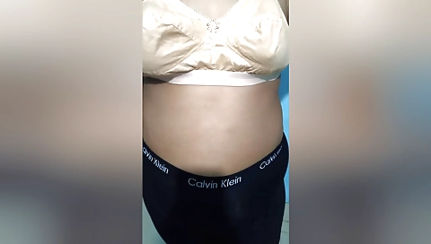 Indian brunette is wearing a sexy dress in solo webcam clip