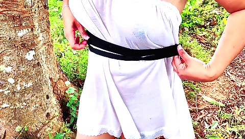 A young girl sucks a large white cock in the woods