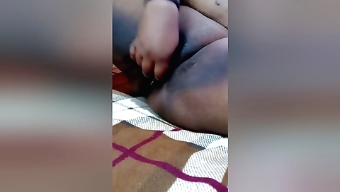 Busty brunette gets her pussy filled with small cucumber toy