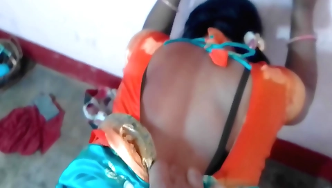 A small boobed brunette gives a blowjob in the bedroom