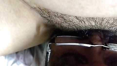 Amateur girl eats her hairy pussy on a black camera