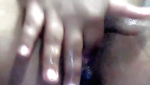 Asian amateur girl masturbates on cam in a solo scene