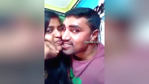 Indian babe with a sexy face is kissing with a boyfriend