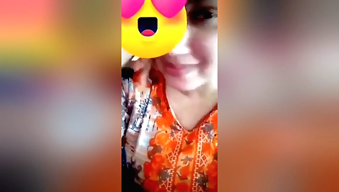 Sexy brunette in a white blouse shows her boobs on webcam