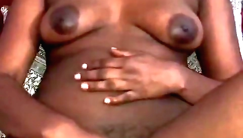 Hot brunette with a hairy pussy plays around with her pussy