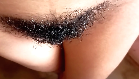 Indian mature showing off her hairy pussy solo film