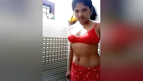 Indian girl with a nice body stretches in her bedroom