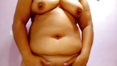 Indian wife on bed trying to cum on her shaved pussy