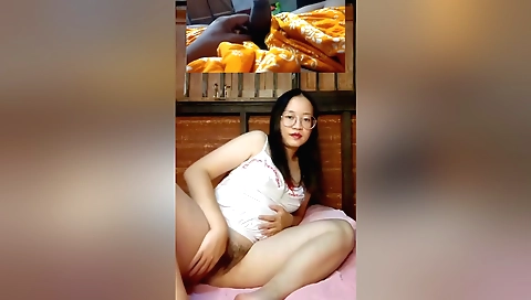 Amateur brunette doctor gives a blowjob to a young asian intern