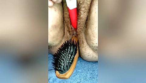 Hindi girl masturbates with hairbrush in her pussy