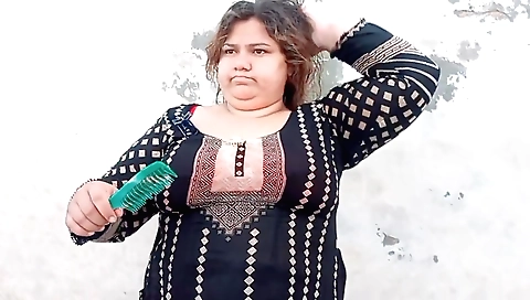 Slutty brunette in red dress and panties in the kitchen