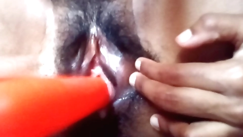 Indian housewife enjoys playing with homemade toys