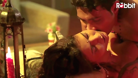 Hot brunette babe in a sexy outfit is getting her hair tied up