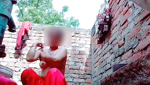 Indian girl in a bikini is in a natural outdoor position