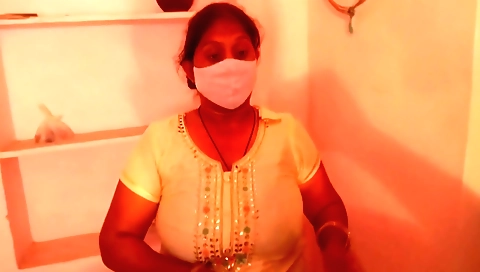 Indian girl walks around the balcony and has fun with her tits