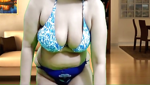 Indian beauty with big tits enjoys herself in the hijab