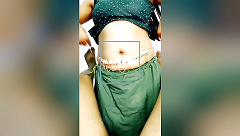 Busty brunette girl is giving a handjob on a guy's dick