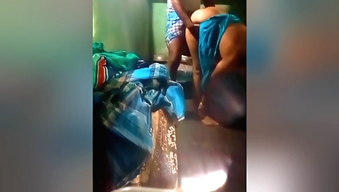 Indian woman with a small body is doing a doggy in the bathroom