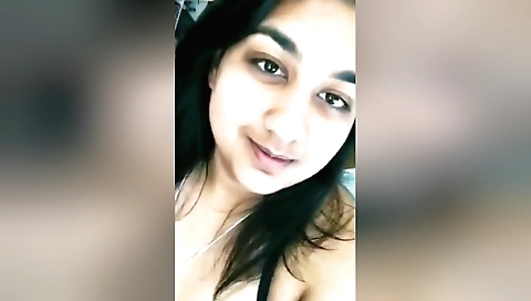 Brunette girl shows off curves and small boobs on webcams