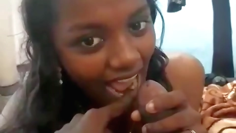 Indian slut sucks his penis and gets a face in the camera