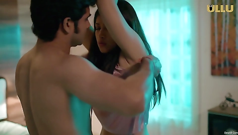 Brunette babe with natural boobs showing off her body